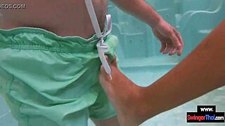 Amateur Thai teen couple does foreplay in public pool before doggystyle sex
