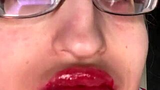 giantess with huge lips n glasses smears snickers bar... mmm so messy!