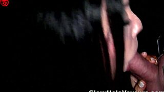 hot brunette slurps that big cock through the gloryhole... damn she's good