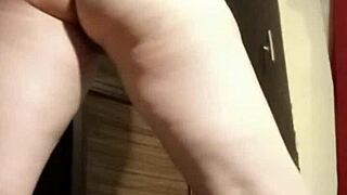 camgirl spreads grey outfit and fingers her ass close up