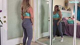 Sexy milf tries on tight gym clothes flashing her huge natural tits everywhere