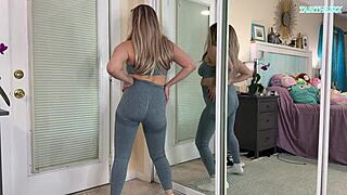 Sexy milf tries on tight gym clothes flashing her huge natural tits everywhere