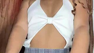 Wanna watch this innocent miniskirt girl finger her tight pussy?