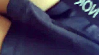 A Latina strolls publicly outdoors without panties flashing natural tits.