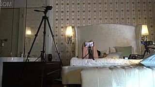 Hot brunette babe teases with big tits and ass in see-through dress