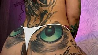 babe's split tongue licks pillow as she rubs pussy fucks ass closeup