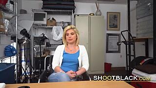 Watch this blonde babe take the director's big black cock deep.