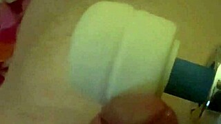 Using magic wand on husband's cock to make him cum.