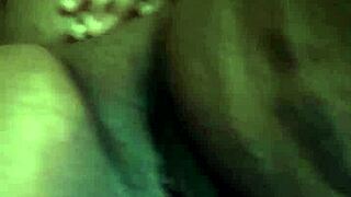 A couple having sex in the dark