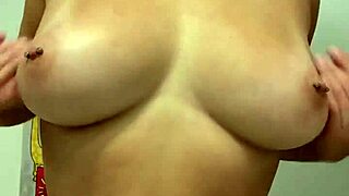 Hey, check out this prostitute stripping off her towel slowly.