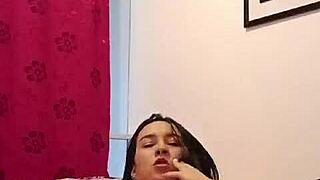 Brenda, Colombian model, performs a virtual show on webcam.