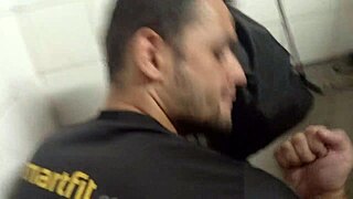 i'm watching this married guy with a big dick fucking a young hairy guy in the smart fit bathroom.