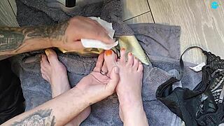 A couple's close up foot worship session with a blonde girlfriend in POV