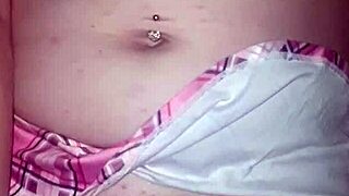 She used her vibrator while wearing sexy lingerie, reaching orgasm.