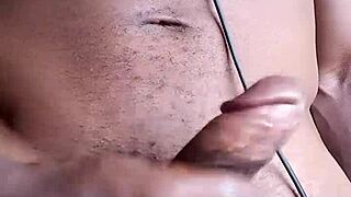 Stroking that big black cock until cum hits the floor, homemade style.