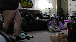 Watch the chubby girl clean the house in shorts.