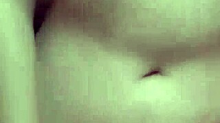 Asian woman fingers wet pussy solo in homemade masturbation