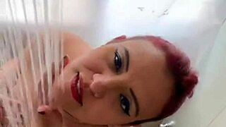 Milf takes steamy shower with big tits exposed