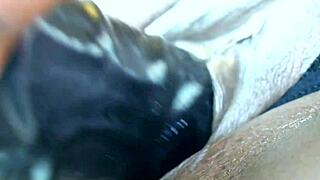 Lesly experiments with a massive dildo in wild action