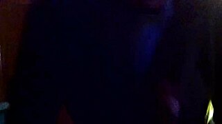 Interracial blowjob video featuring a milf performing oral sex on a large cock in detailed close-up.