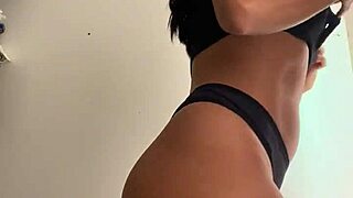 Naughty wife trying on shorts in the mall store with big ass.