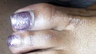 Toes teasing cock in footjob