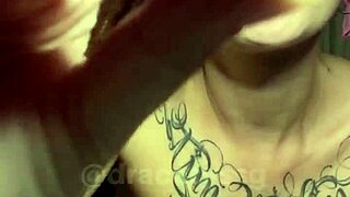 Red-haired beauty flaunts herself and has sex with her vibrator