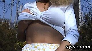 The farmer’s daughter gets fisted and fucked in the ass by a group of people outdoors.