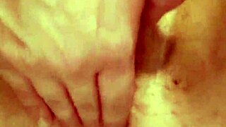 sitting firmly on the large seat in the room