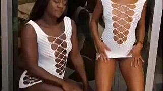 Two hot black babes dance and flash their wet pussies on New Year's!