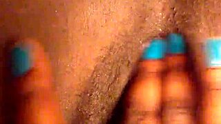i am playing with my pretty ebony pussy in close up