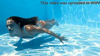 Ivi Rein's petite Russian body shines underwater at the pool