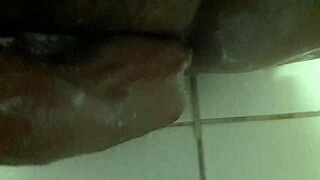 Pounding my toy in the shower for a wild solo session. Can't get enough of that tight grip!