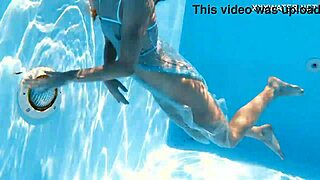 Ivi Rein's petite Russian body shines underwater at the pool