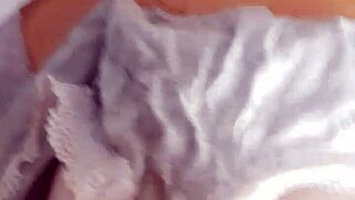 In a retro vibe, she played with toys for a steamy blue film scene in 1977.