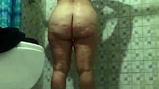 Hidden Camera Catches My Mature Stepmother Flashing Big Tits In The Shower!