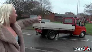 British blonde flashes perky assets in public with daring outdoor pissing