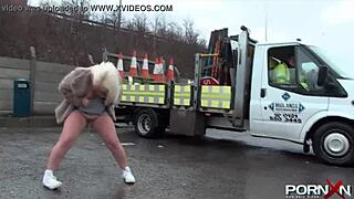 British blonde flashes perky assets in public with daring outdoor pissing