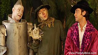 Blonde milf parodies holiday sex with couple, blowjob, handjob, and cumshot