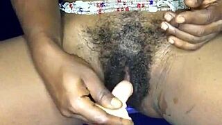 Hot ebony from Ghana enjoys solo play with dildo
