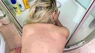 Blonde Luna Seduces with Big Tits for Bathroom Action