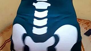 Aurora Estelar in her long video wearing a calaverita dress