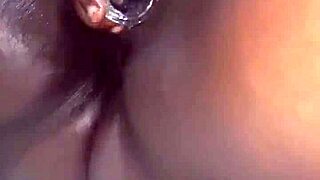 Black beauty enjoys solo play with a huge toy and squirts