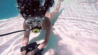 brita piskova dives underwater in the swimming pool. the teen 18+ masturbates solo.