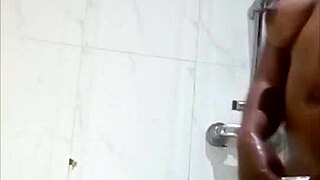 Beautiful girlfriend’s naked body in the shower at the hotel room